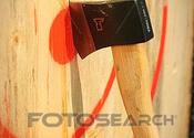 Main thumb an axe stuck in the middle of a wooden stock image  k54061303